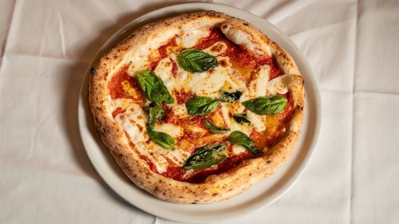 Margherita pizza with fresh basil and buffalo mozzarella